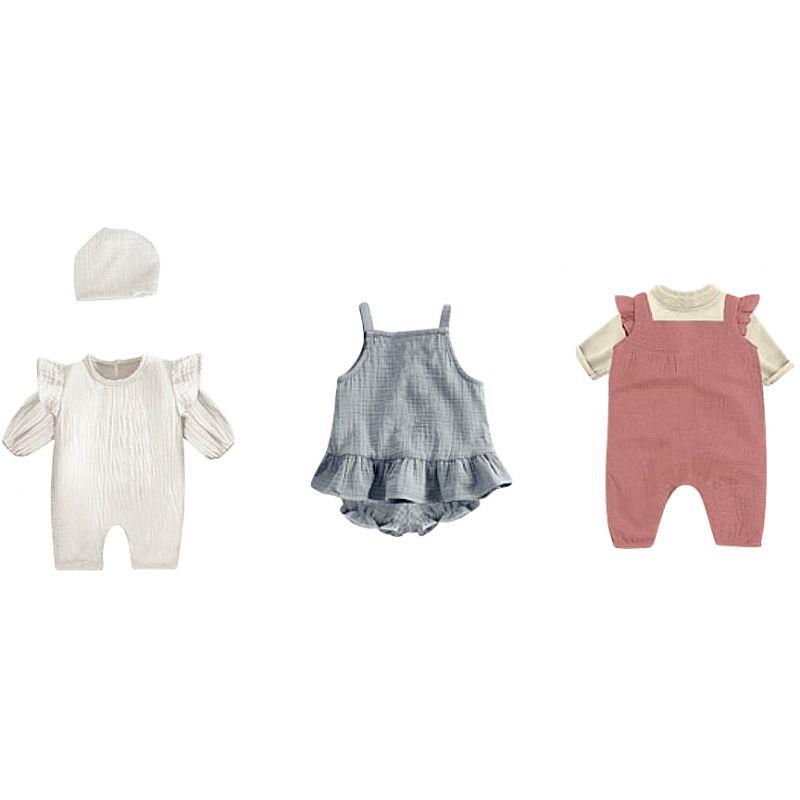 Image de  Lot de 3 tenues filles pour poupées 21 cm 
